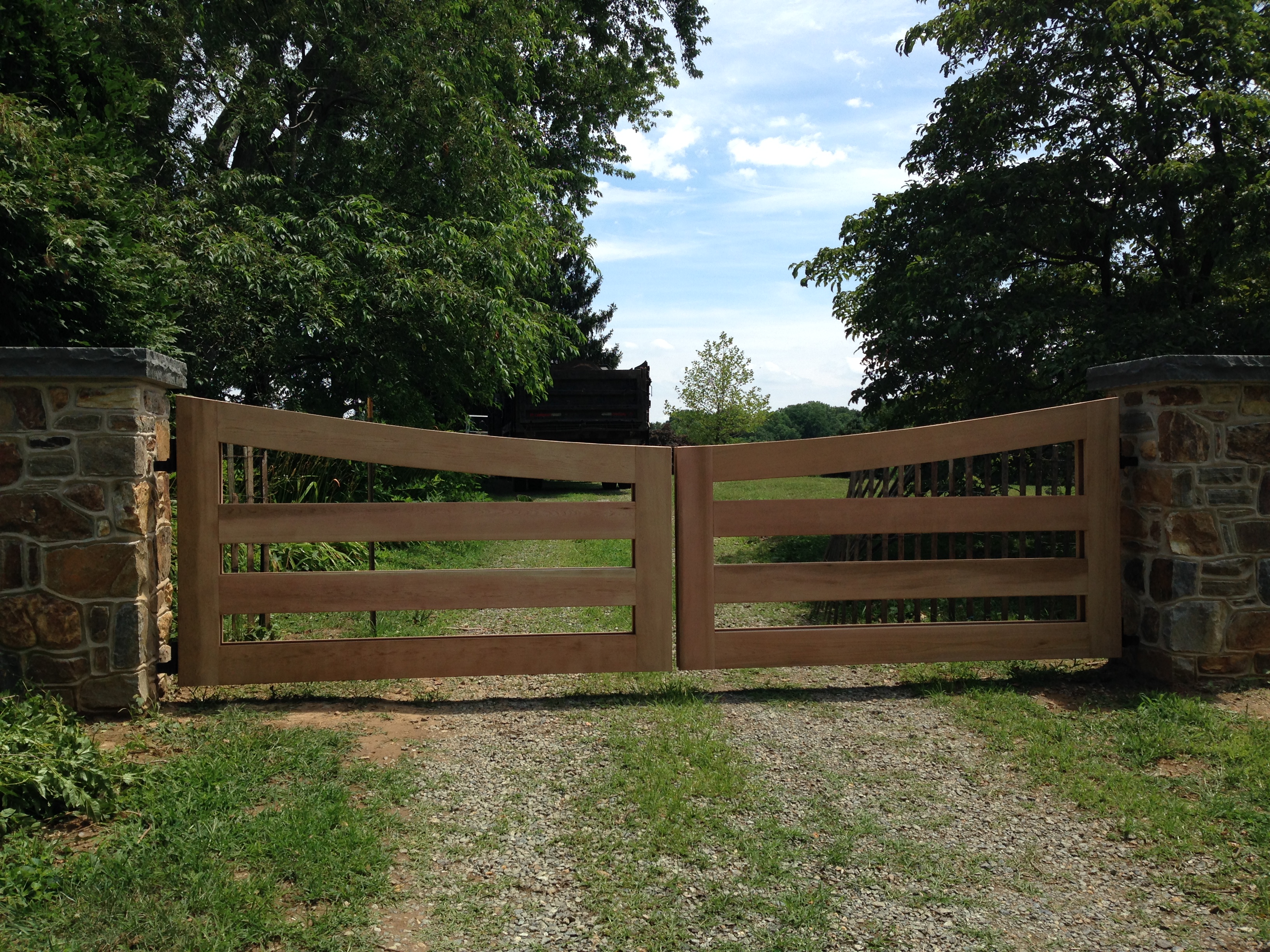 Cedar gate at horse stable and estate entrance